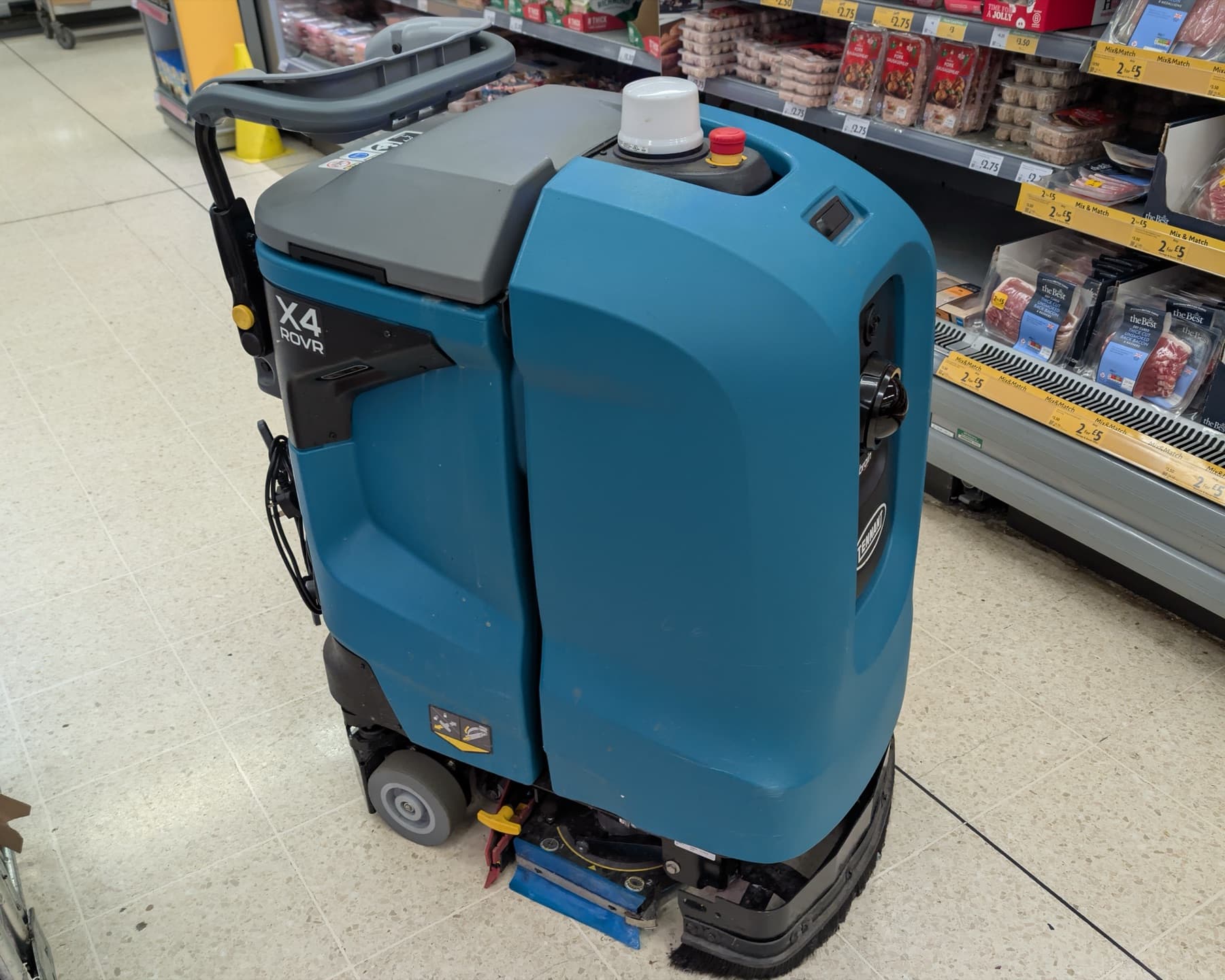 Retail store aisle where autonomous robots operate